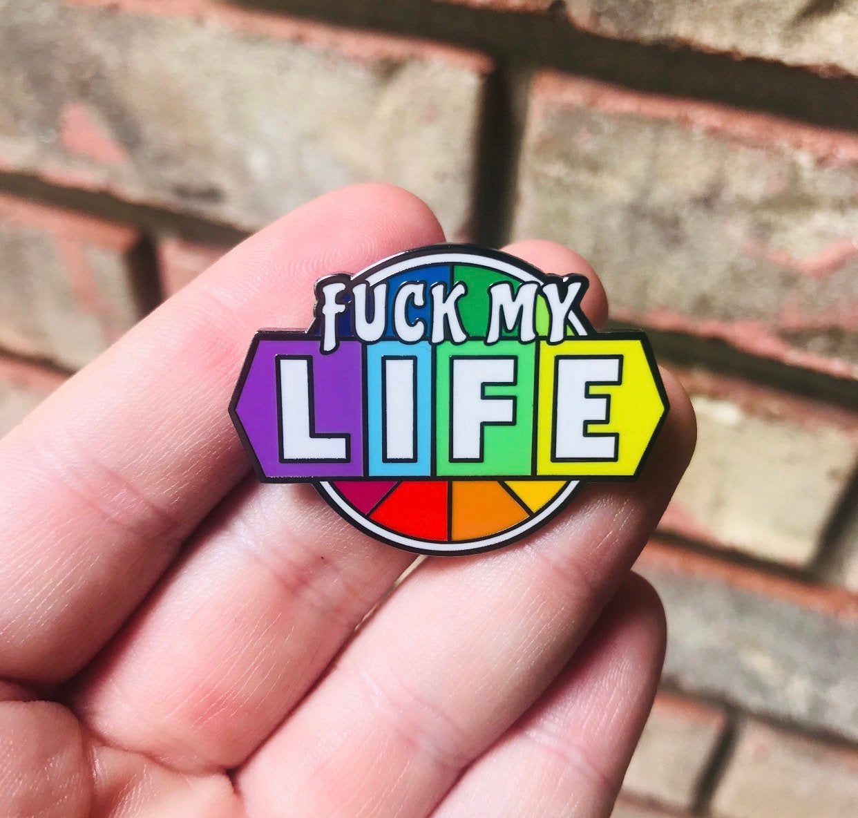 FML Enamel Pin | funny enamel pins | wheel of fortune pins